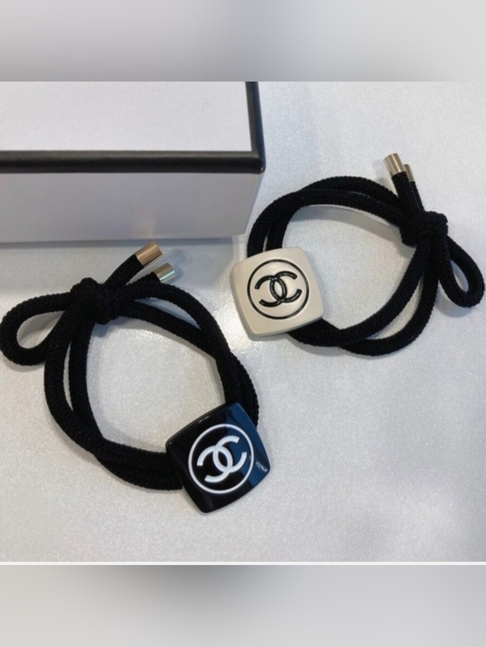 CHANEL Black and Cream Double CC Resin Logo Elastic Hair Tie Duo